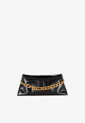 1945 Embossed Monogram Clutch Bag