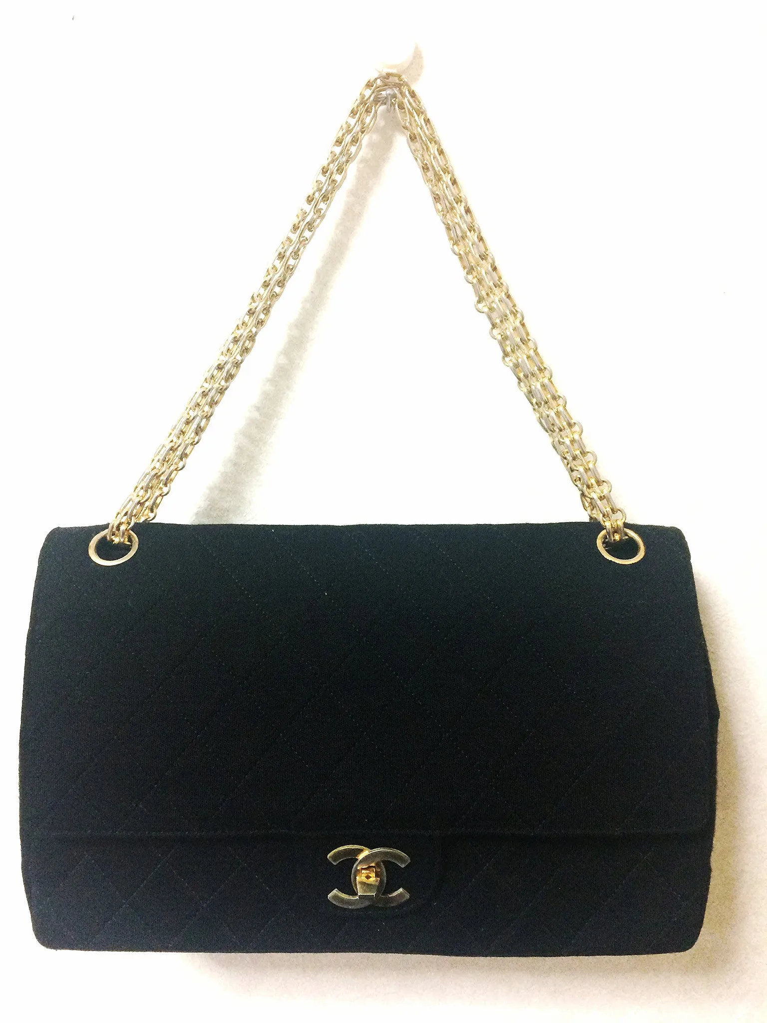 70's vintage Chanel classic black jersey 2.55 bag with double flap and skinny chain straps. One-of-a-kind bag. Ves