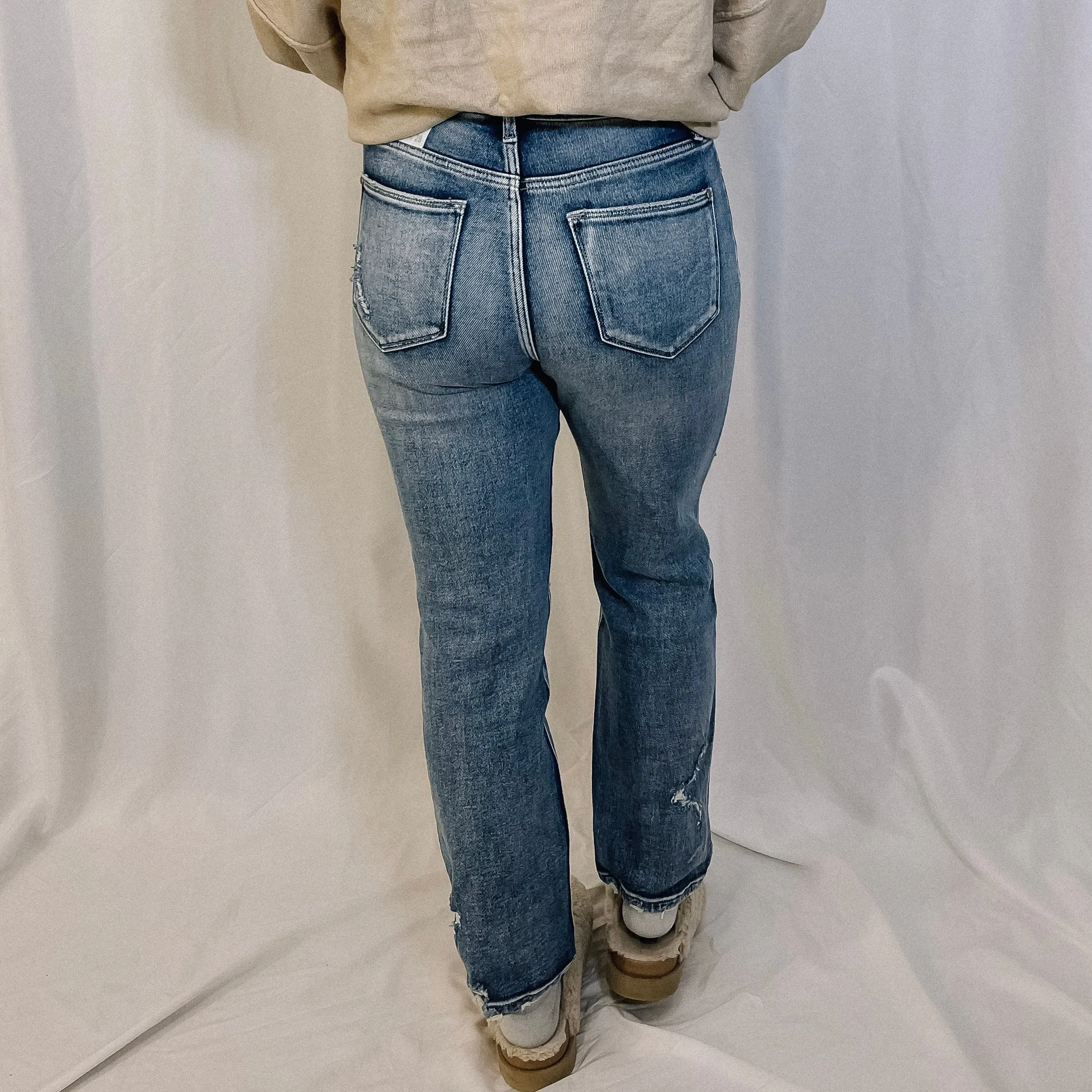Logan Distressed Slim Straight Leg Denim