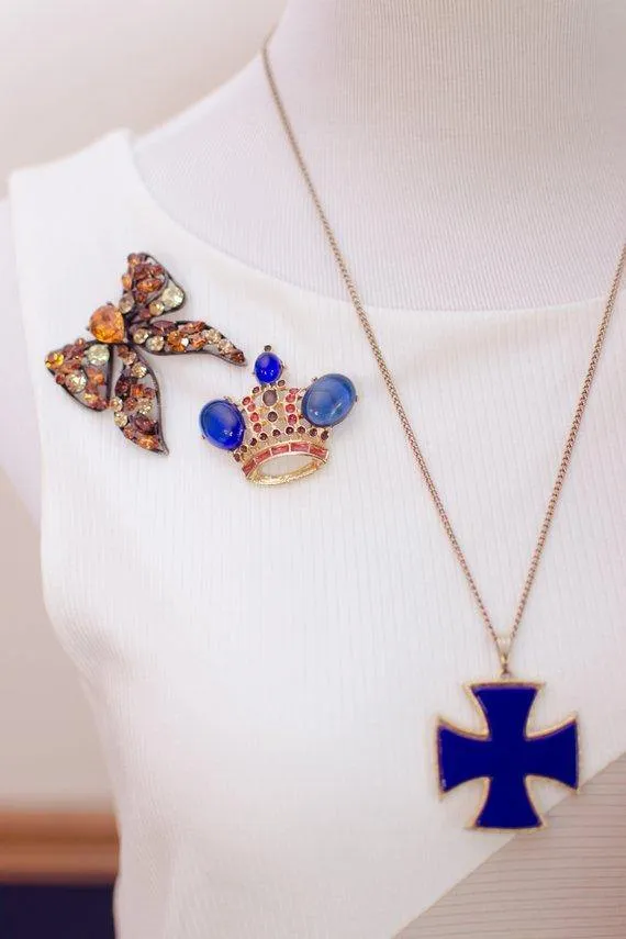 Vintage Royal Gold Crown Brooch with Sapphire Blue Cabochons and Red and Gray Enamel Accents